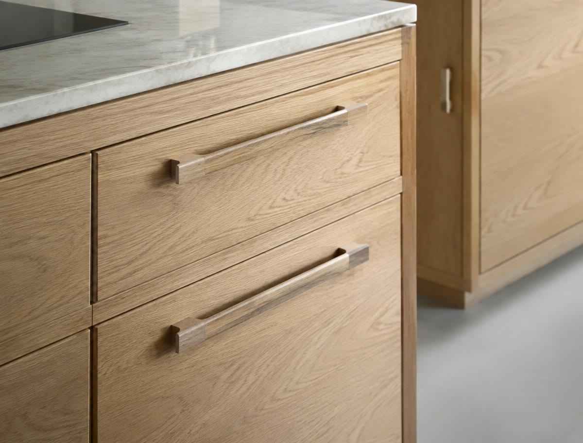 Close detail of white oak cabinetry drawers